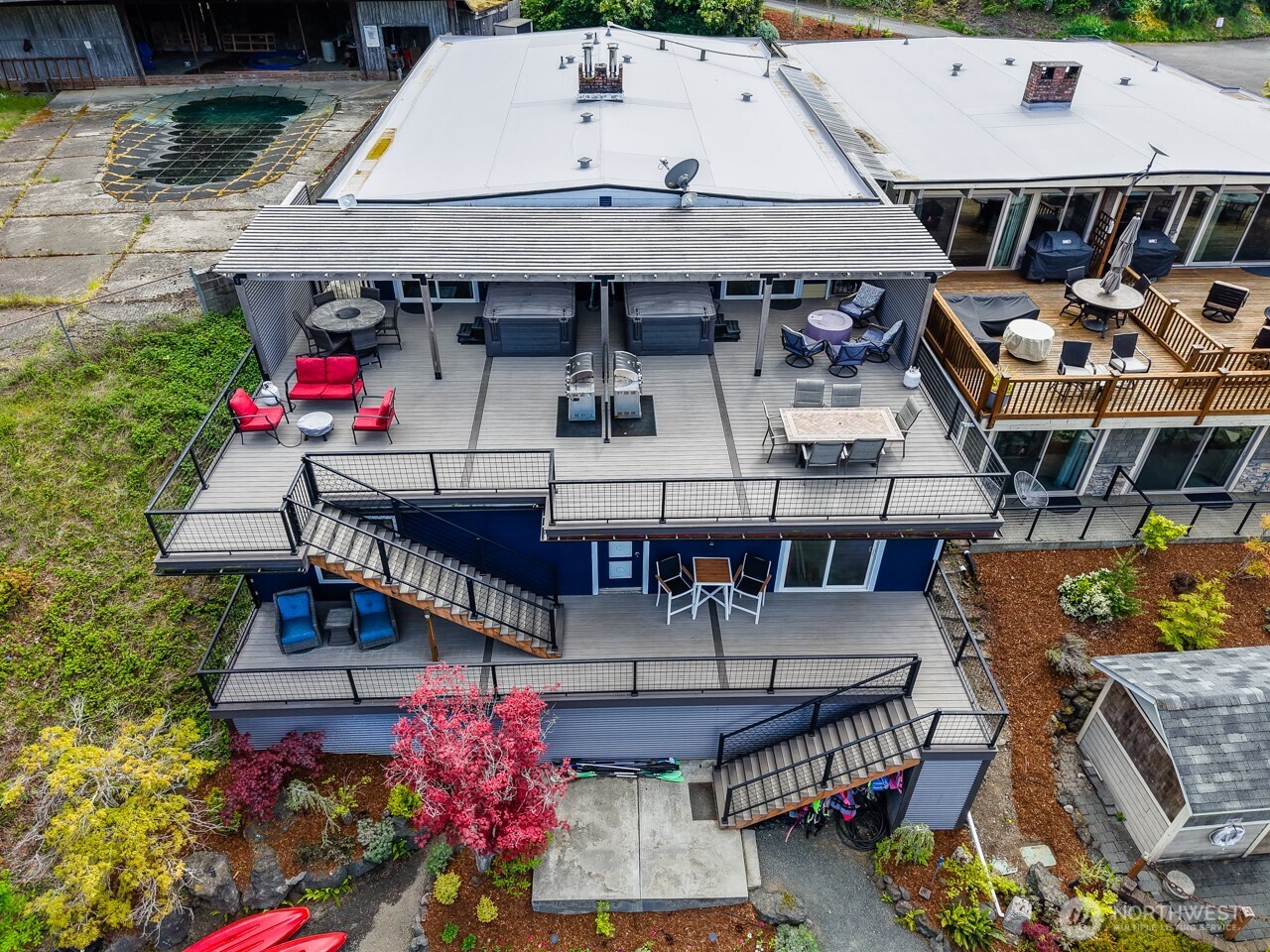 90-92 Mallard Cove Road Port Angeles, WA 98363 - Photo 40 of 40 an aerial view of a house with wooden floor and outdoor seating