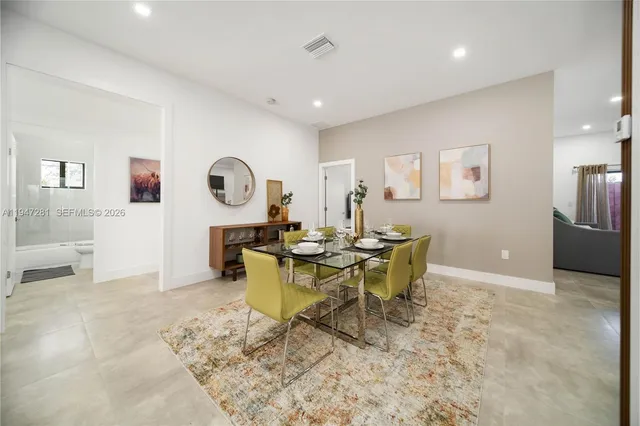 a view of a dining room with furniture