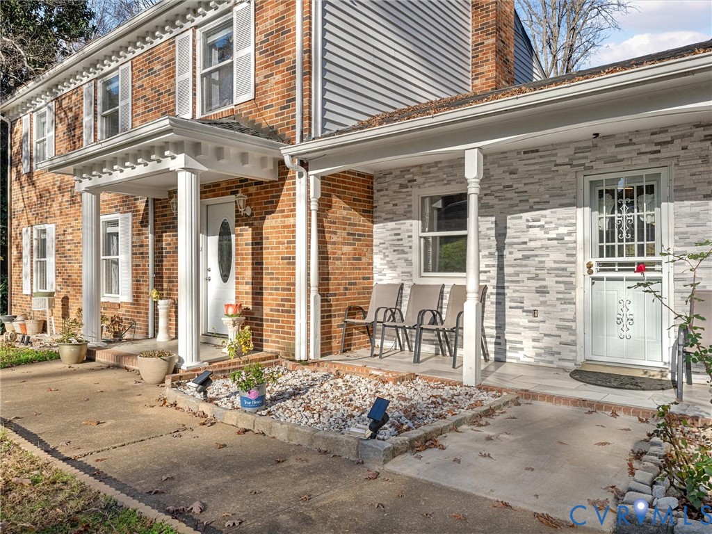 4709 Southmoor Road Richmond, VA 23234 - Photo 2 of 27 front of a brick house with a large windows