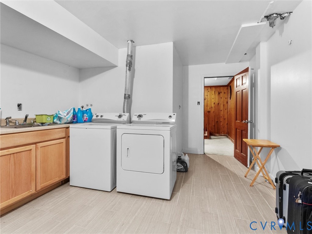 4709 Southmoor Road Richmond, VA 23234 - Photo 21 of 27 a utility room with sink dryer and washer