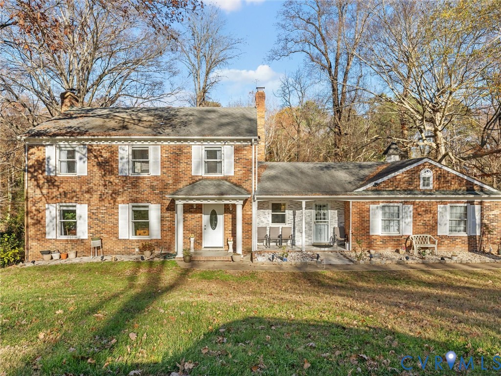 4709 Southmoor Road Richmond, VA 23234 - Photo 23 of 27 a front view of a house with a yard