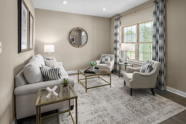 a en suite bathroom with double sink and a mirror