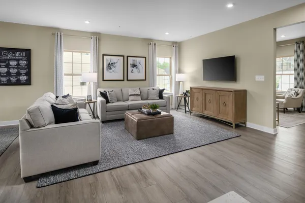 a spacious bedroom with a bed and window