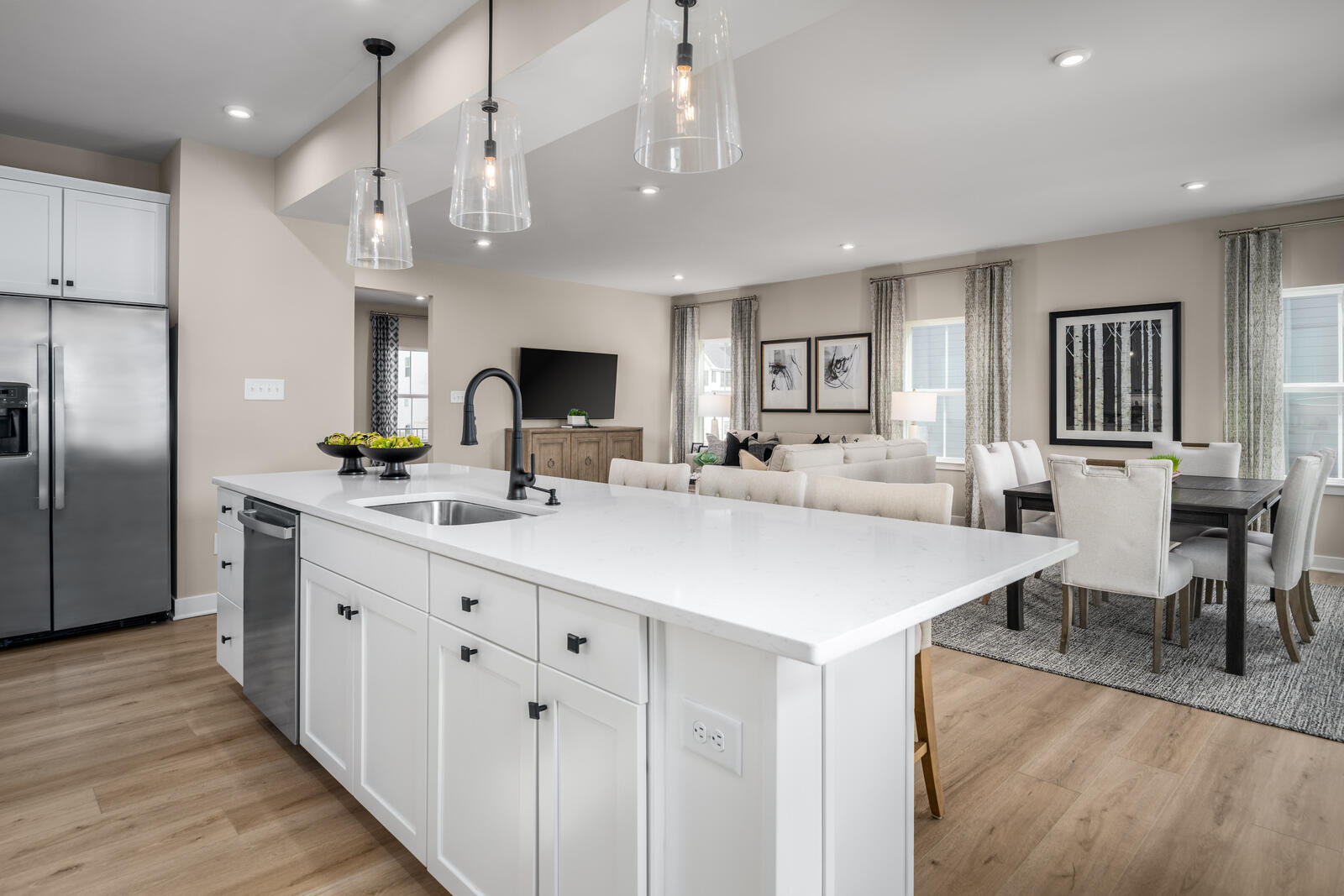 7215 Fairway Ridge Road Salem, VA 24153 - Photo 34 of 79 a kitchen with stainless steel appliances kitchen island granite countertop a table chairs refrigerator and microwave