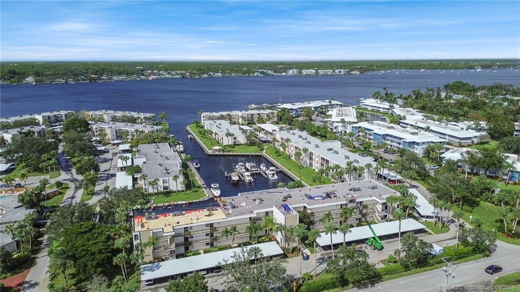 1950 Southwest Palm City Road, Unit 5103 Stuart, FL 34994 - Photo 24 of 24 an aerial view of a house with a lake view