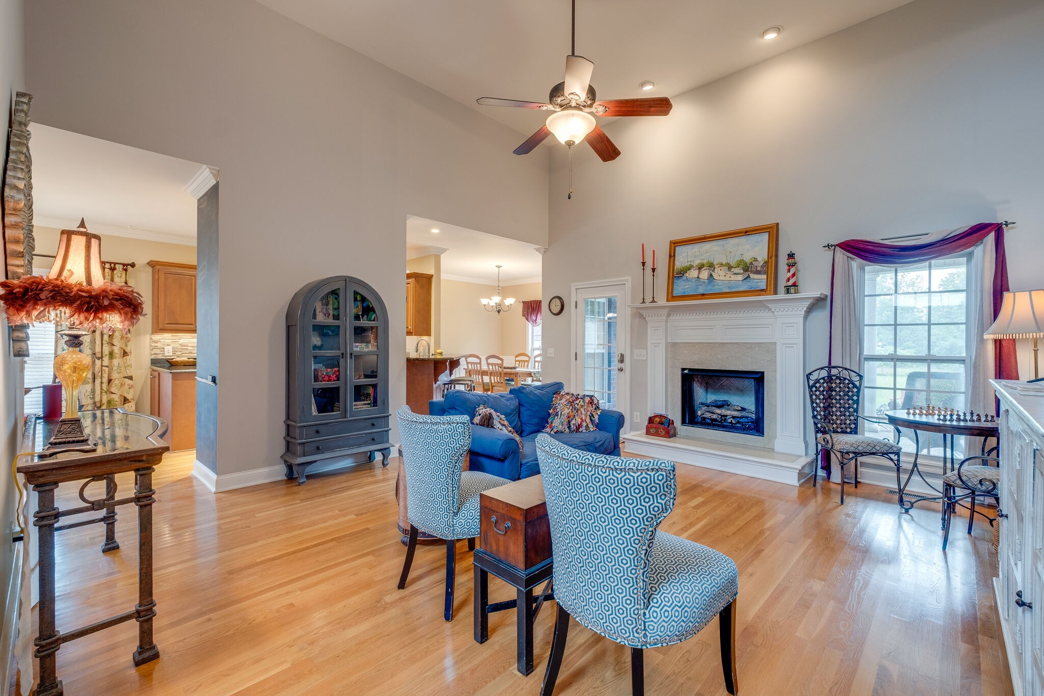 734 Heritage Road Lebanon, TN 37087 - Photo 8 of 38 a living room with furniture fireplace and dining table