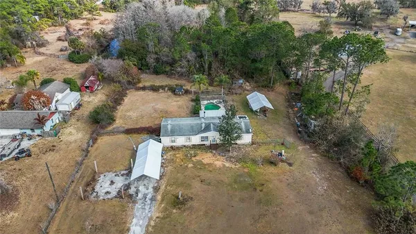 a view of a backyard of a house