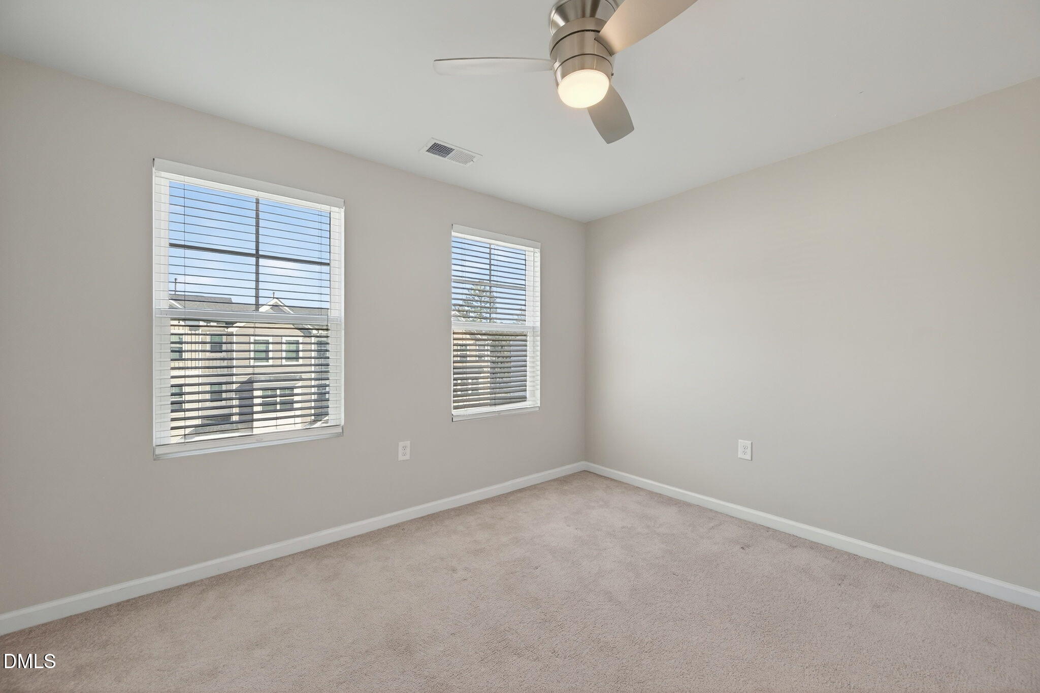 1063 Shoreside Drive Durham, NC 27713 - Photo 27 of 35 a view of an empty room with a window