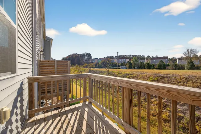 a view of balcony with furniture