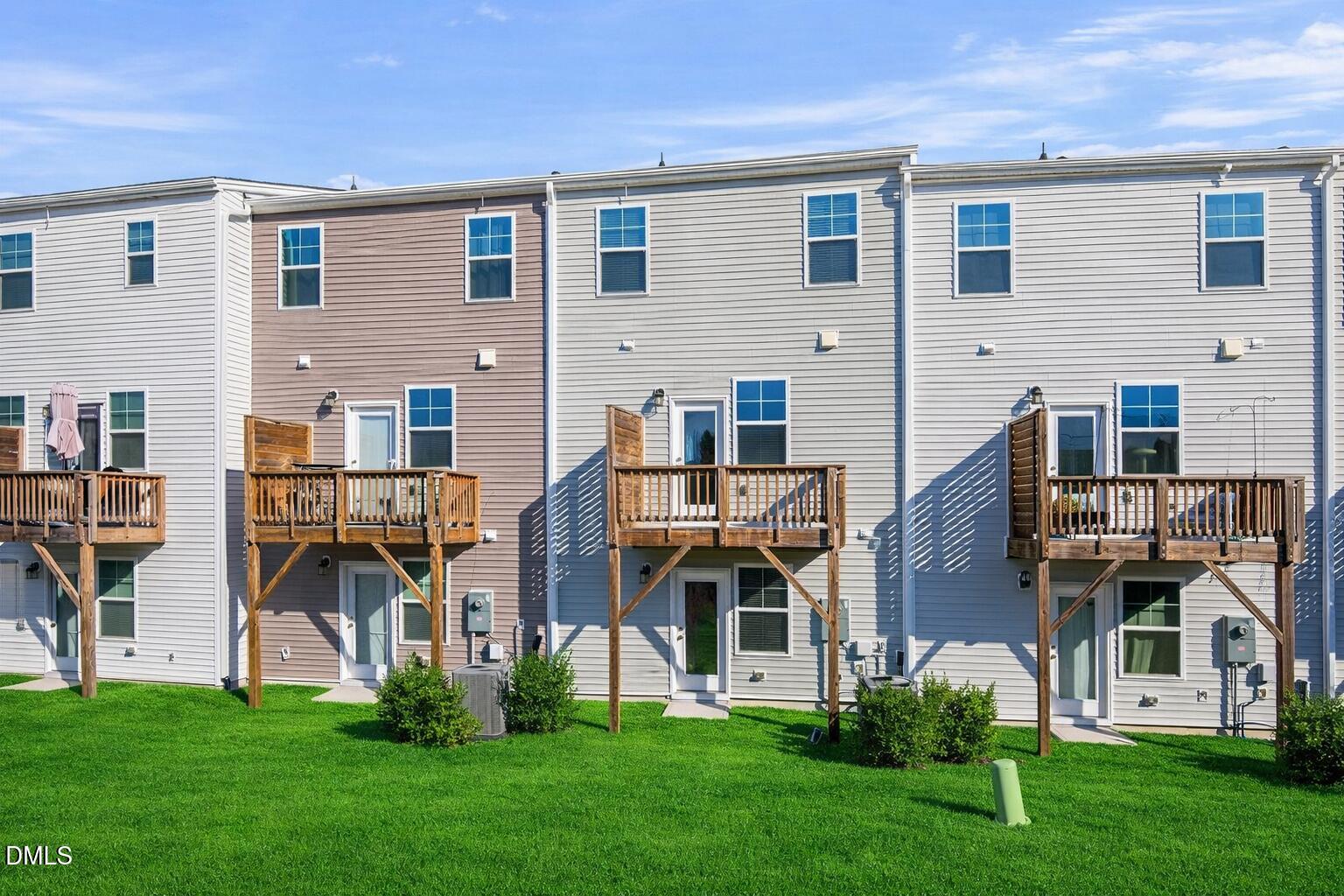 1063 Shoreside Drive Durham, NC 27713 - Photo 34 of 35 a front view of house with yard and green space