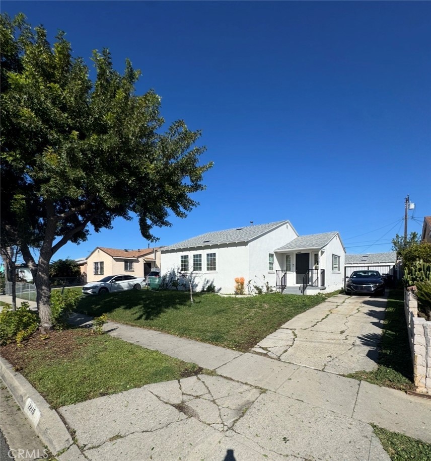 a view of house with outdoor space