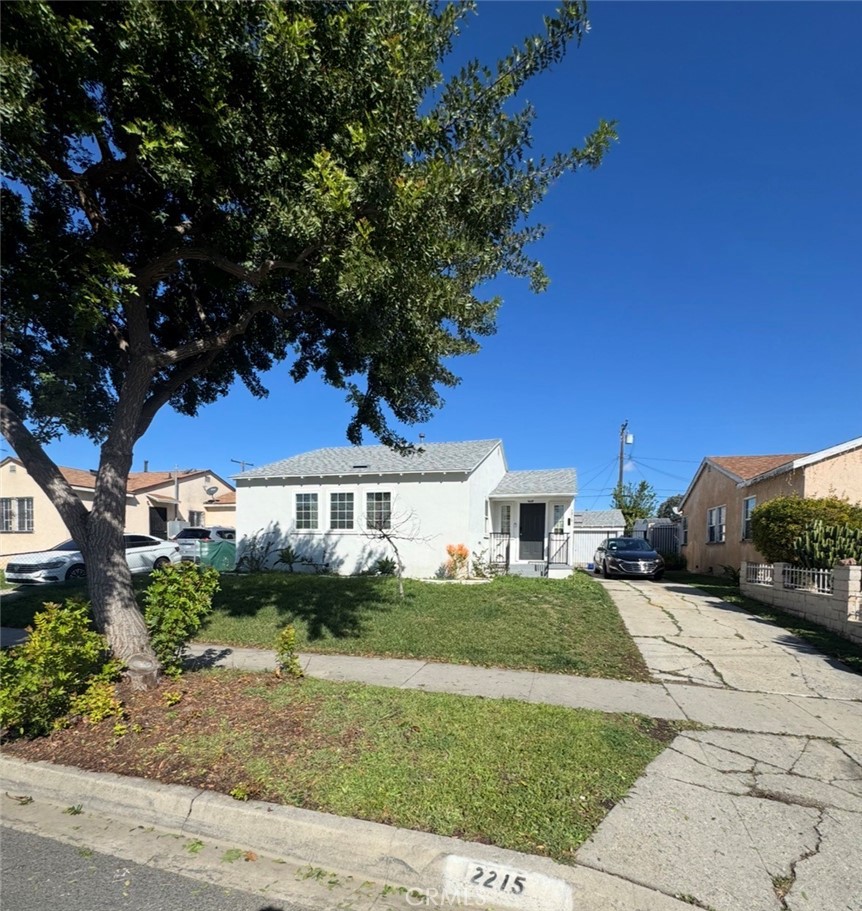 2215 West 153rd Street Compton, CA 90220 - Photo 2 of 2 a view of a house with a yard