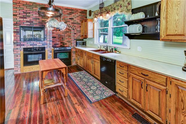 31 Golden Hollow Road Kelso, TN 37348 - Photo 6 of 20 Kitchen with Corian Counter and Copper sink.