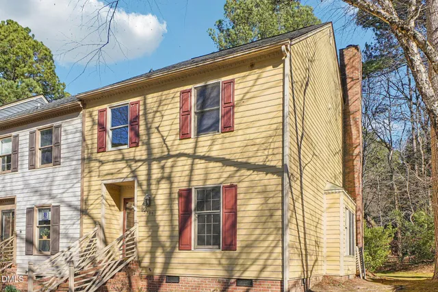 a view of a chandelier fan in a room