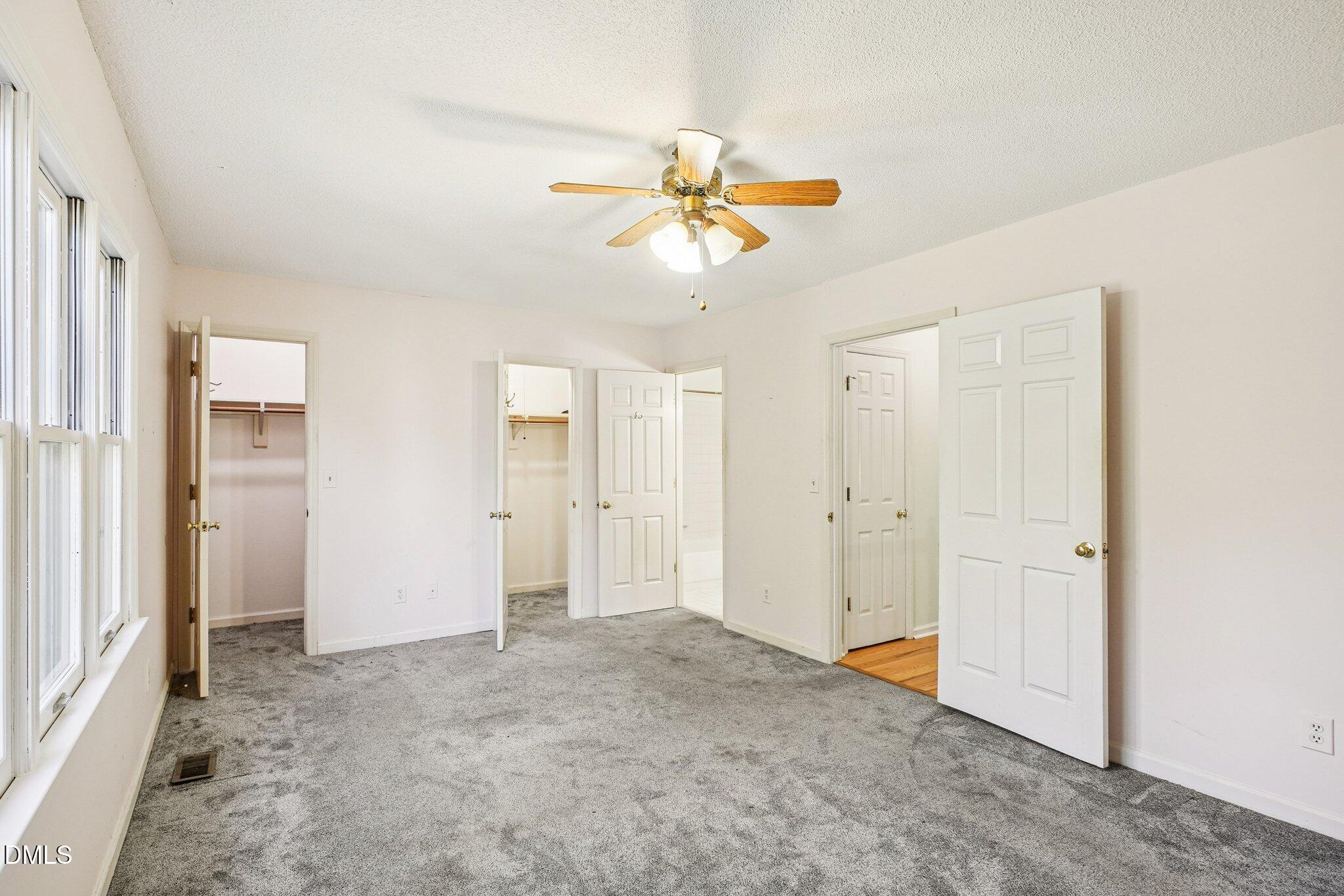 3305 Coachman's Way Durham, NC 27705 - Photo 17 of 35 a view of a chandelier fan in a room