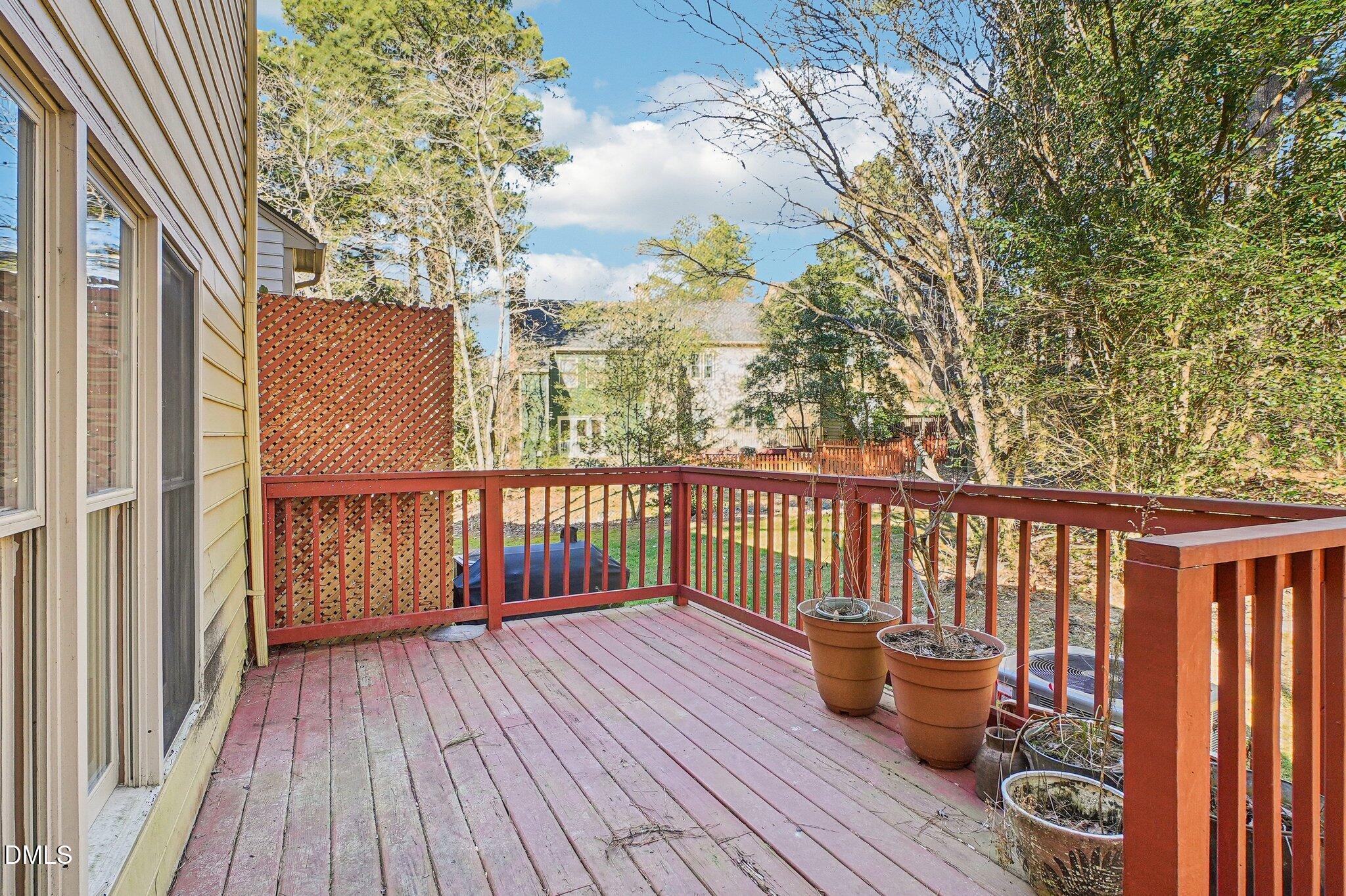 3305 Coachman's Way Durham, NC 27705 - Photo 31 of 35 a balcony with wooden floor table and chairs