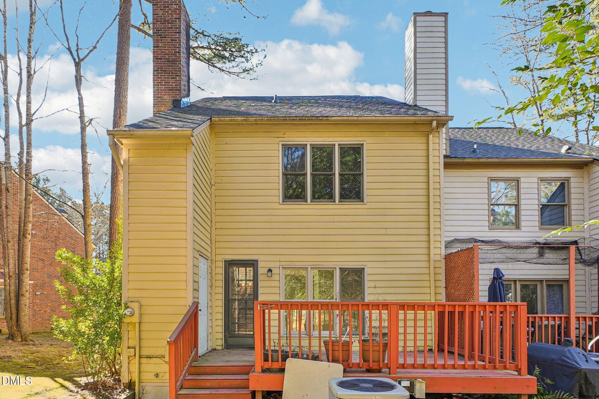 3305 Coachman's Way Durham, NC 27705 - Photo 33 of 35 a view of a house with a wooden fence