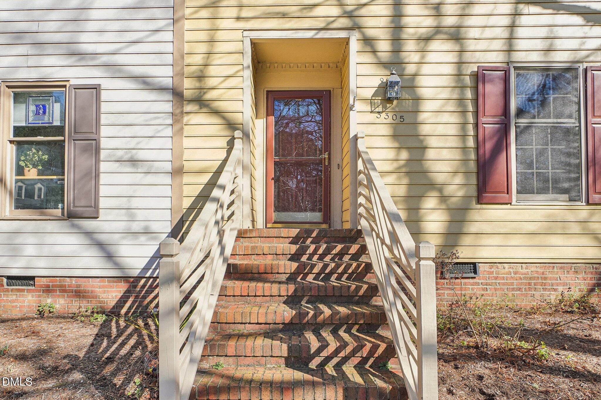 3305 Coachman's Way Durham, NC 27705 - Photo 3 of 35 a view of entryway with a front door