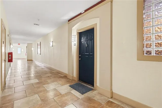 a swimming pool with outdoor seating and yard