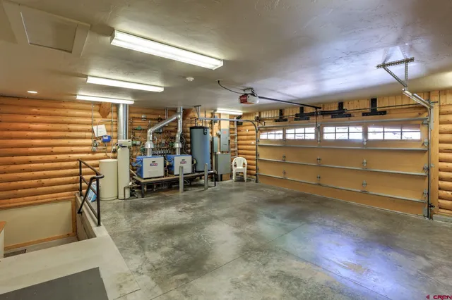 a view of an empty room with storage