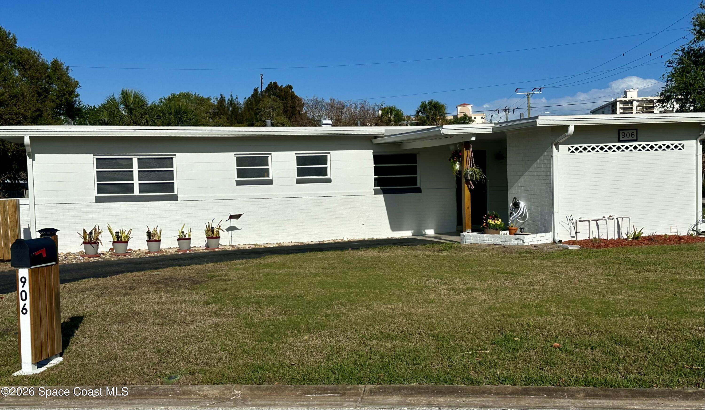 906 Santa Cruz Road Cocoa Beach, FL 32931 - Photo 1 of 24 Front