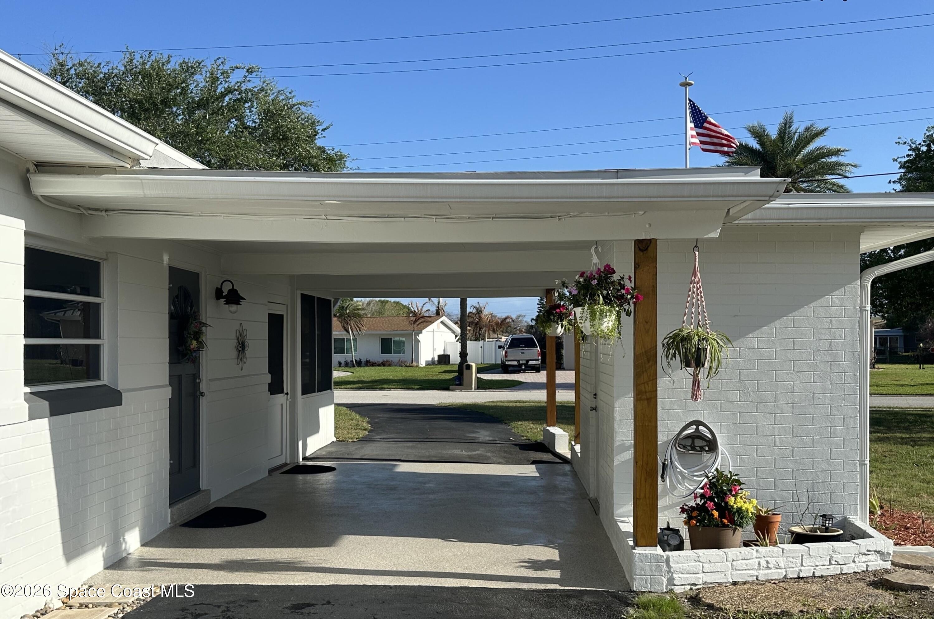 906 Santa Cruz Road Cocoa Beach, FL 32931 - Photo 3 of 24 Carport 2