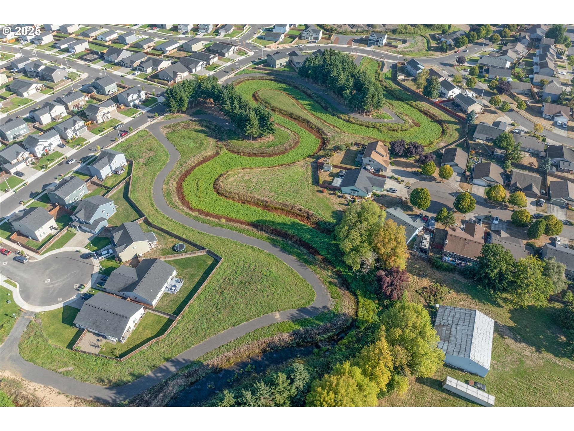 1906 Melody Way Longview, WA 98632 - Photo 37 of 39 an aerial view of residential houses with outdoor space
