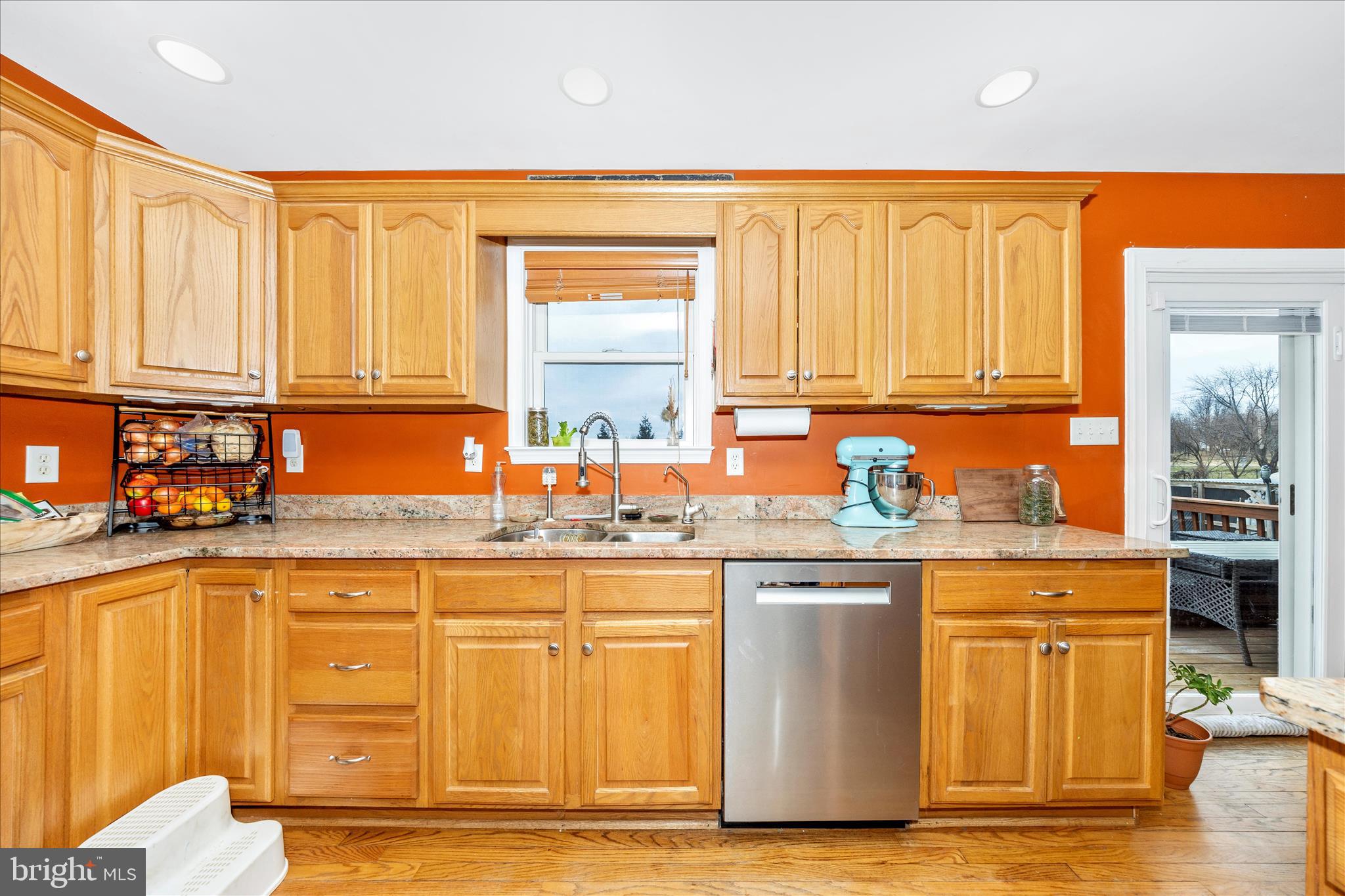 4120 Petersville Road Knoxville, MD 21758 - Photo 11 of 52 a kitchen with stainless steel appliances granite countertop a stove top oven a sink dishwasher and cabinets with wooden floor