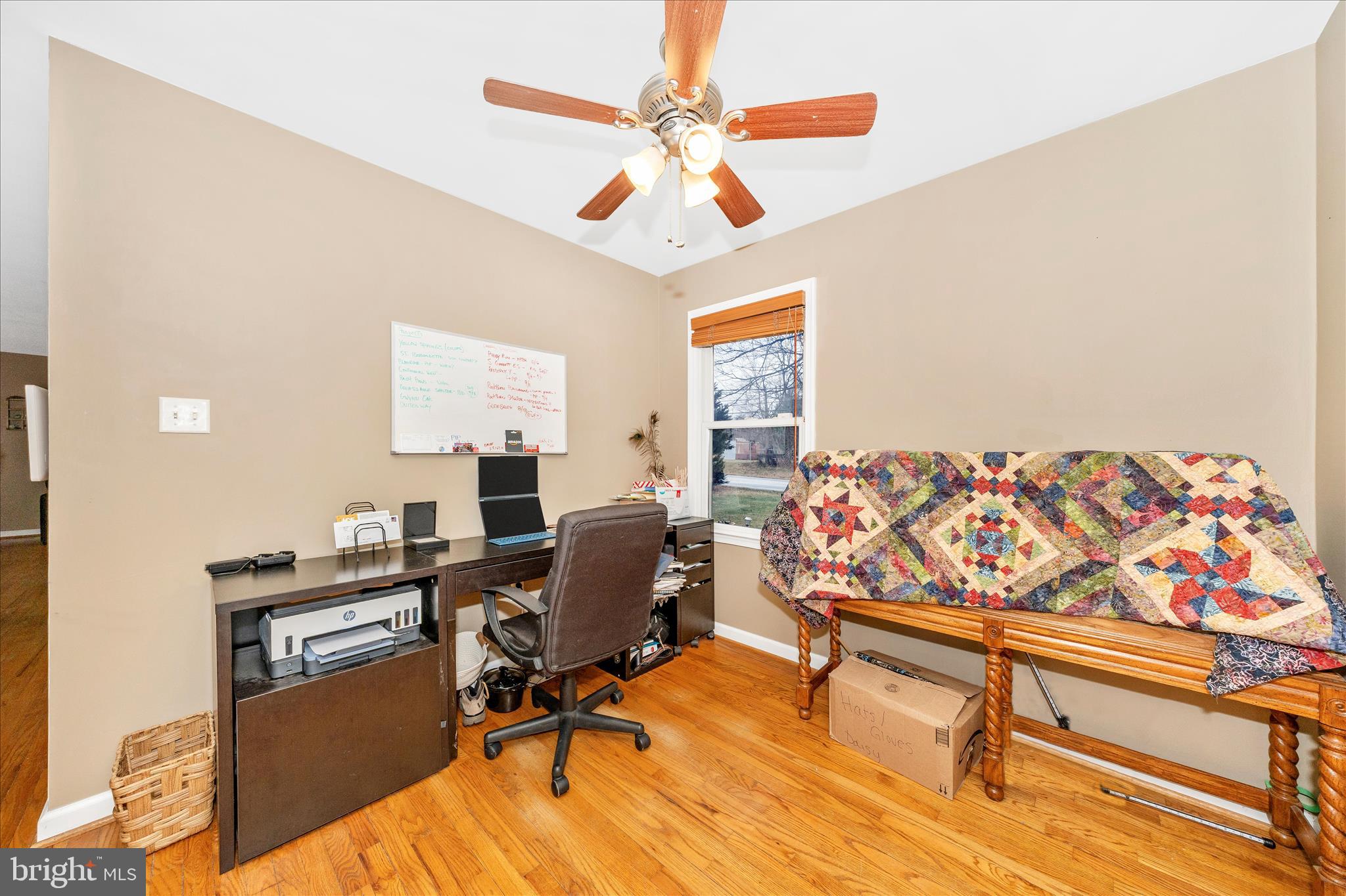 4120 Petersville Road Knoxville, MD 21758 - Photo 16 of 52 a view of a workspace with furniture and a window