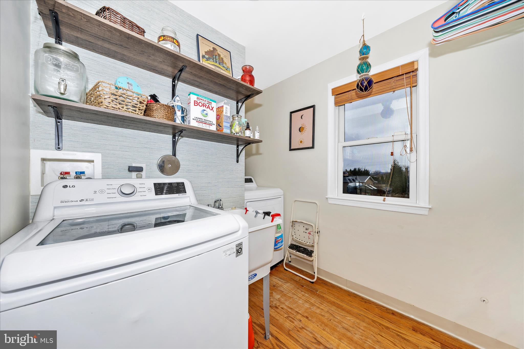 4120 Petersville Road Knoxville, MD 21758 - Photo 17 of 52 a utility room with dryer washer and a view of living area