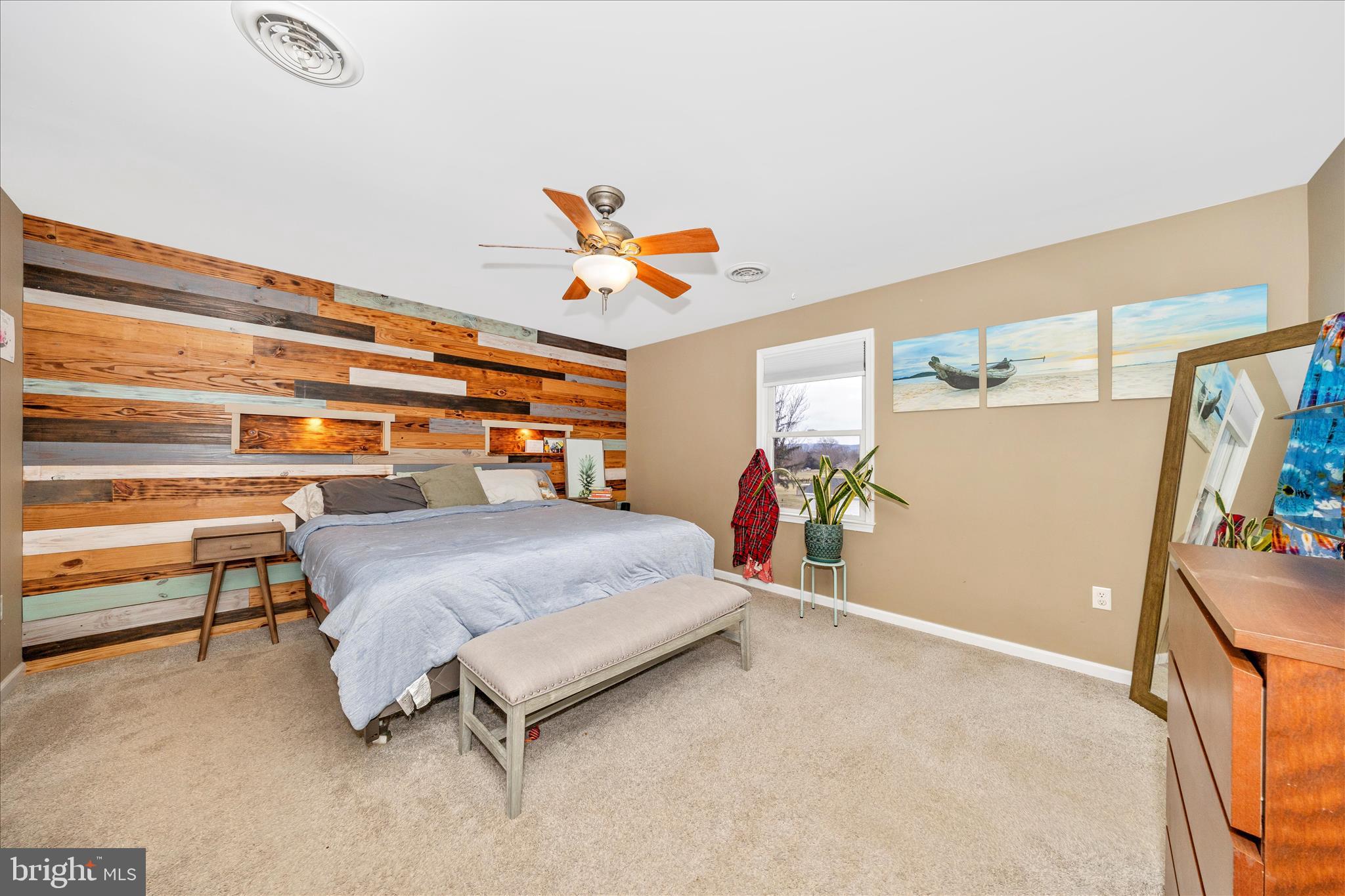 4120 Petersville Road Knoxville, MD 21758 - Photo 20 of 52 a bedroom with a bed and a chandelier