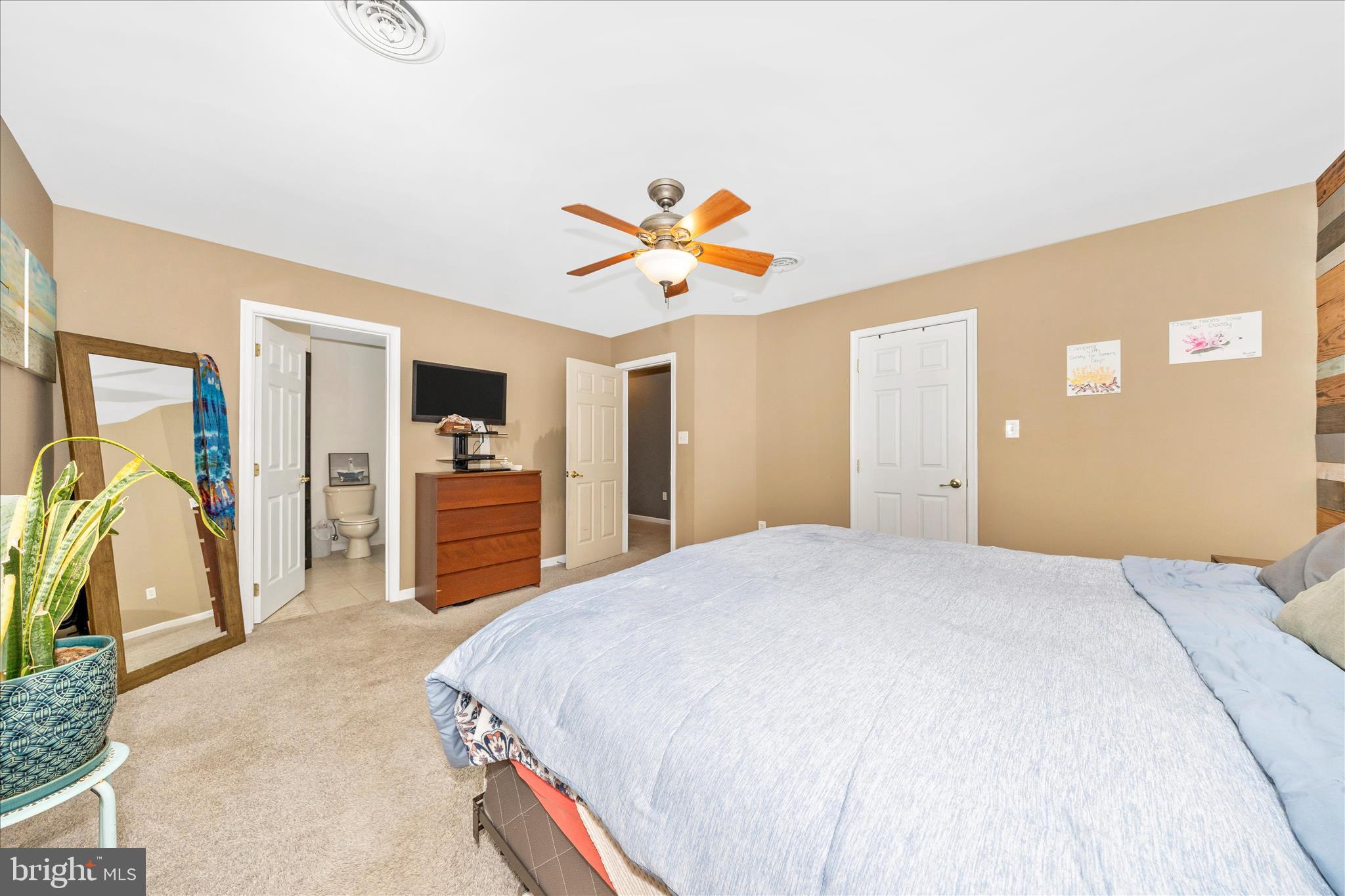 4120 Petersville Road Knoxville, MD 21758 - Photo 21 of 52 a spacious bedroom with a bed and a chandelier