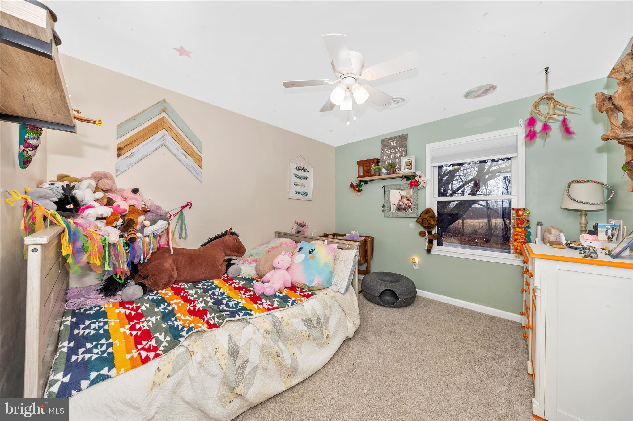 4120 Petersville Road Knoxville, MD 21758 - Photo 26 of 52 a bed room with a bed and a chandelier