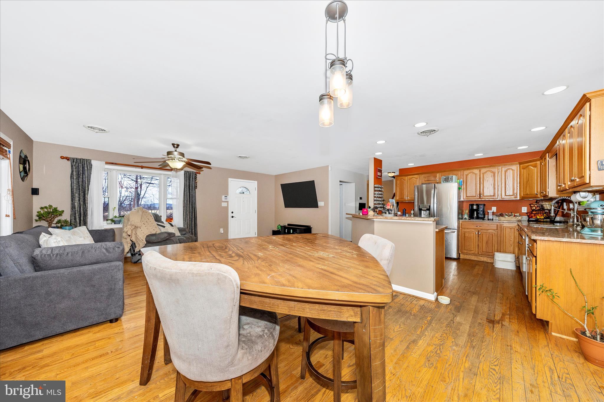 4120 Petersville Road Knoxville, MD 21758 - Photo 6 of 52 a view of a dining room with furniture one side kitchen view and wooden floor