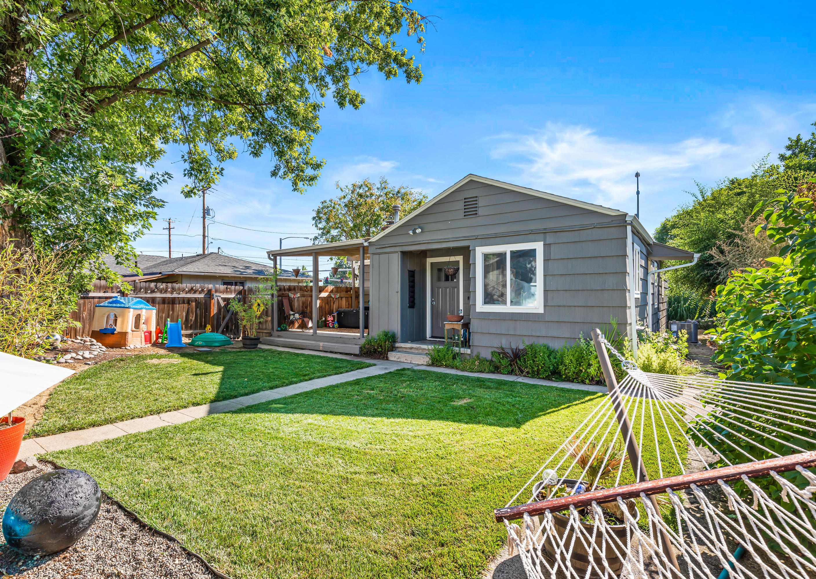 2425 Table Rock Road Medford, OR 97501 - Photo 23 of 26 a view of an house with backyard and patio
