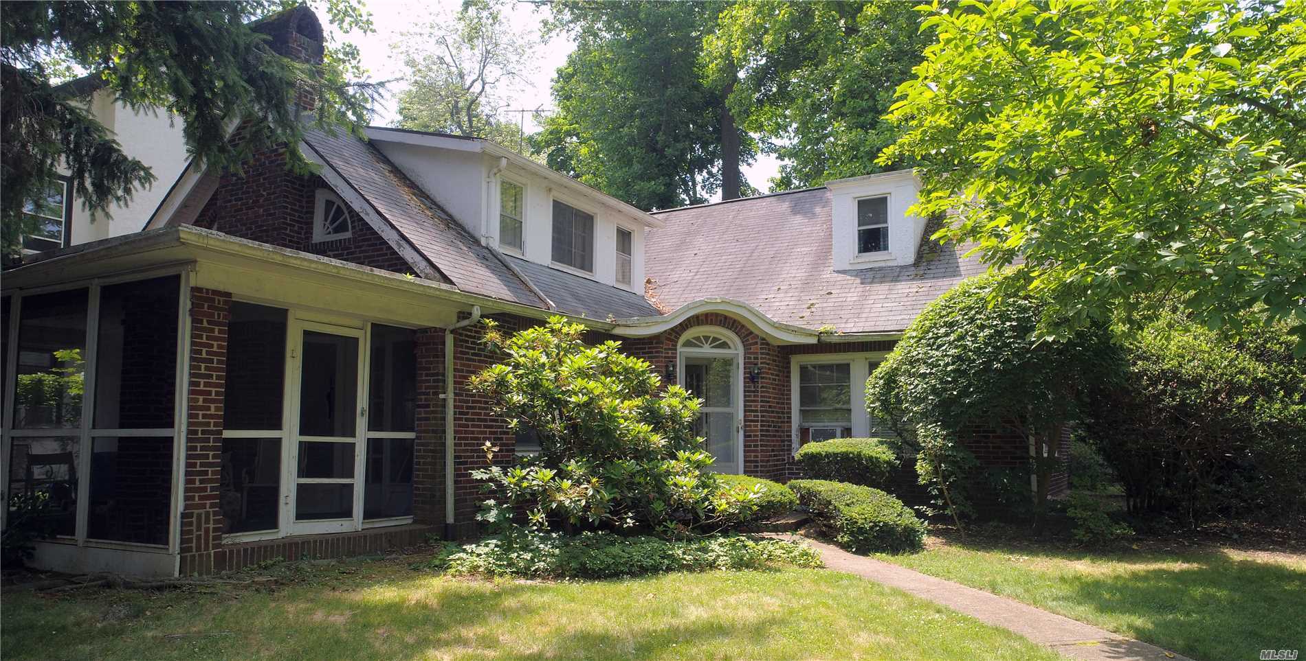 11 Lodge Road Great Neck, NY 11021 - Photo 1 of 1 a view of a house with a yard and potted plants