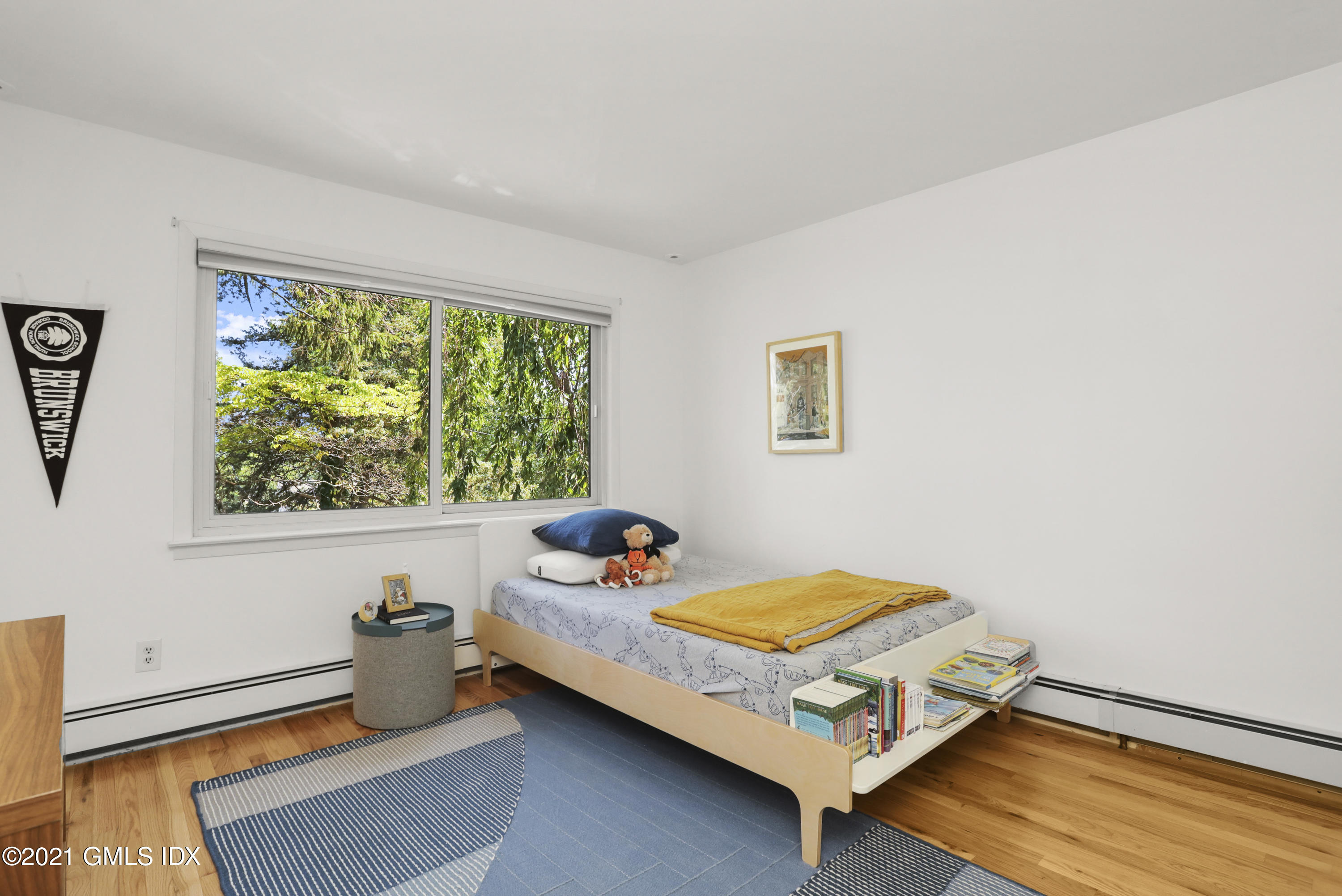 10 Ridge Road Cos Cob, CT 06807 - Photo 12 of 23 a bedroom with a bed and a window