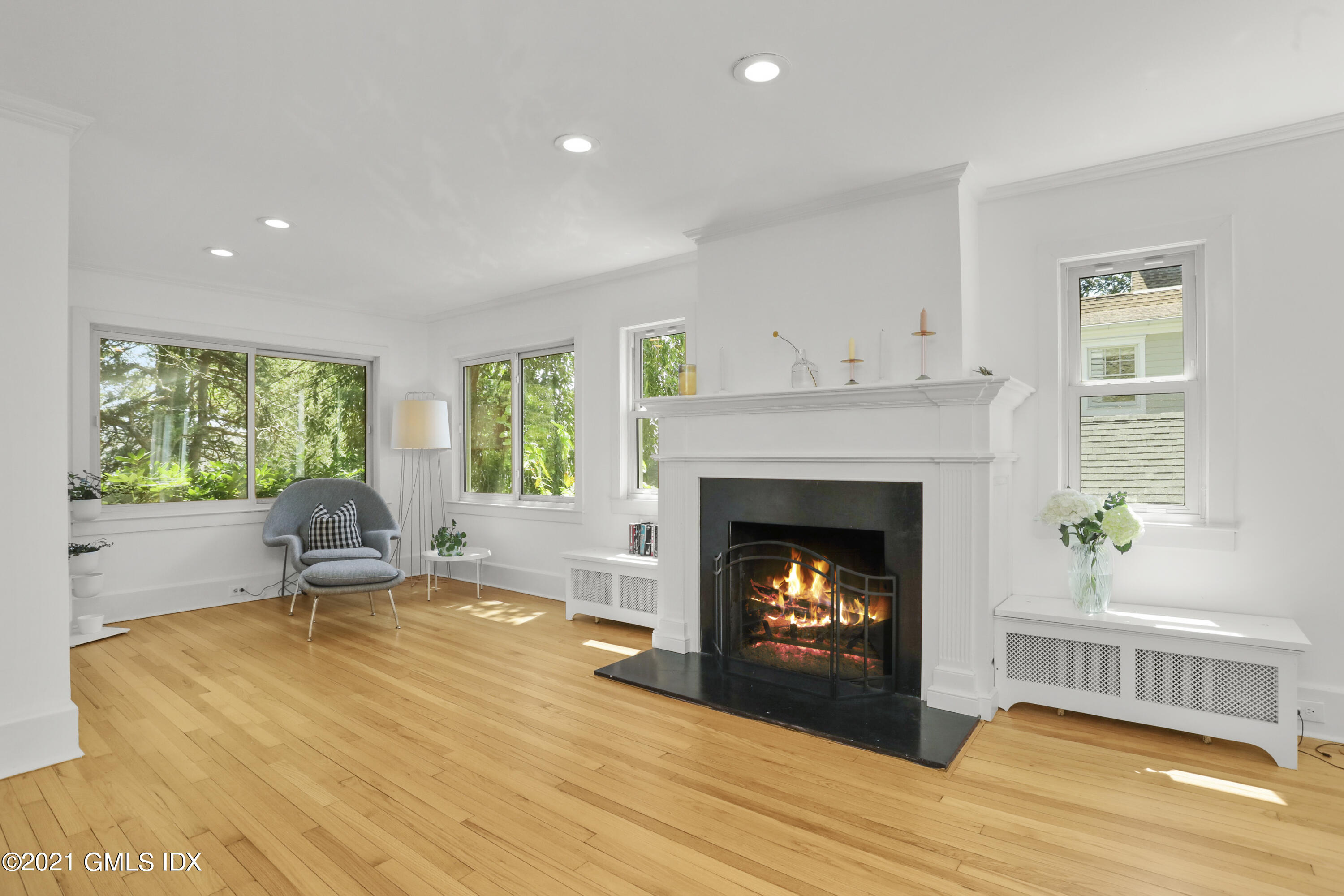 10 Ridge Road Cos Cob, CT 06807 - Photo 2 of 23 a living room with furniture and a fireplace