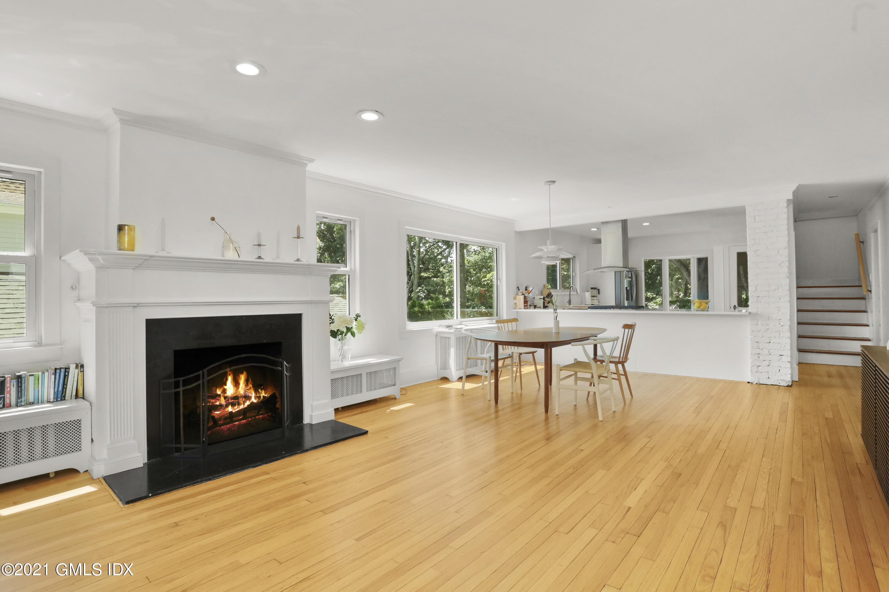 10 Ridge Road Cos Cob, CT 06807 - Photo 3 of 23 a living room with furniture and a fireplace