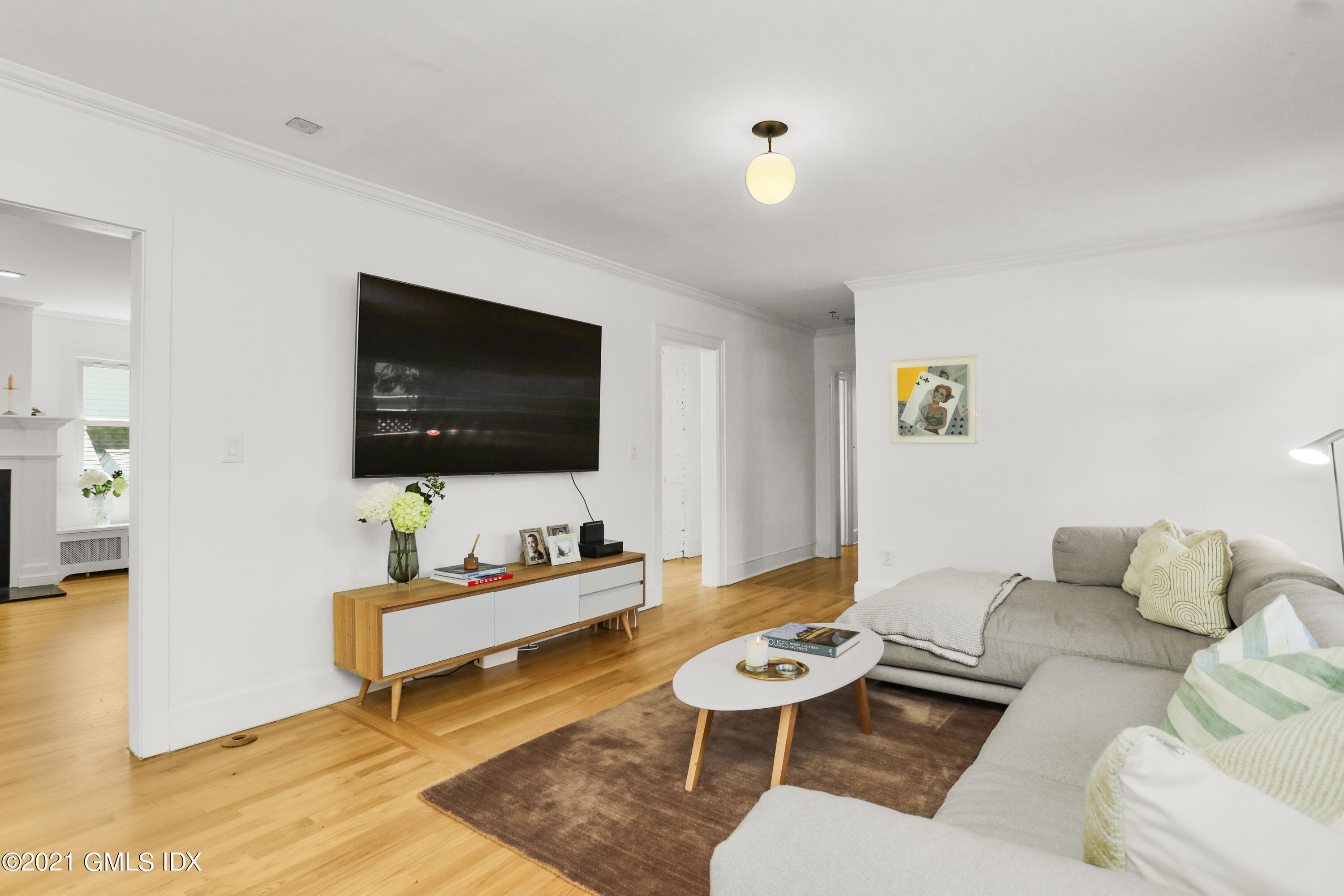 10 Ridge Road Cos Cob, CT 06807 - Photo 5 of 23 a living room with furniture and a flat screen tv