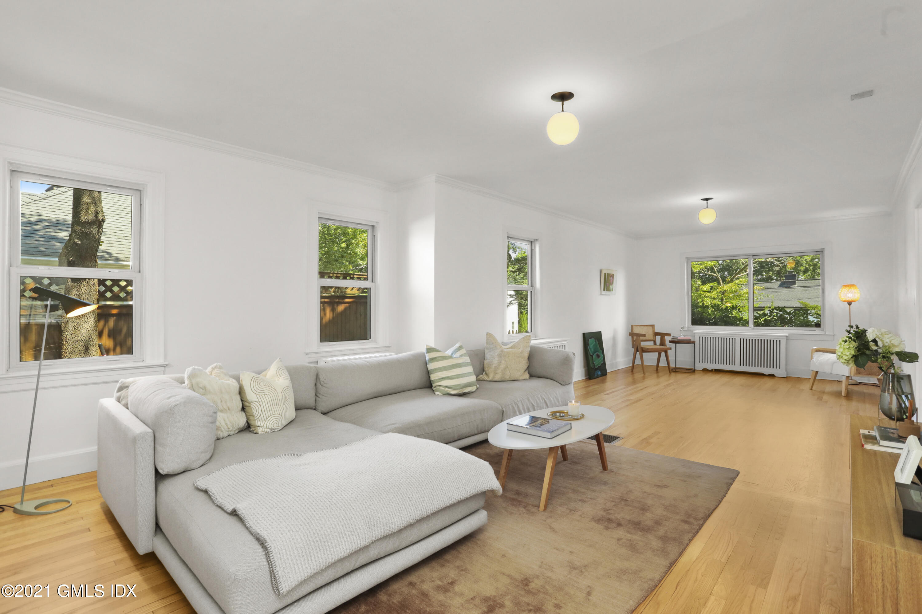 10 Ridge Road Cos Cob, CT 06807 - Photo 6 of 23 a living room with furniture and a large window