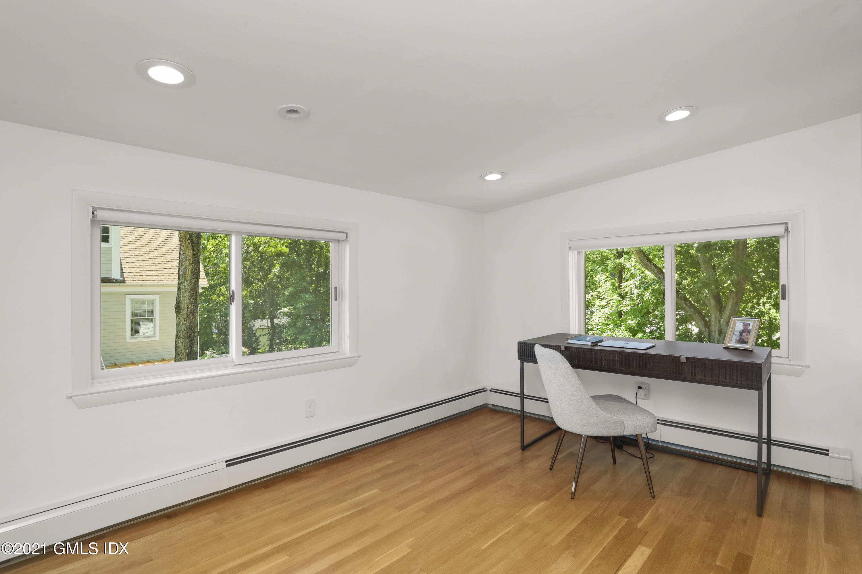 10 Ridge Road Cos Cob, CT 06807 - Photo 10 of 23 a workspace with wooden floor and a window