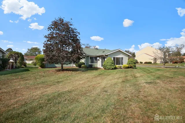 a house view with a garden space