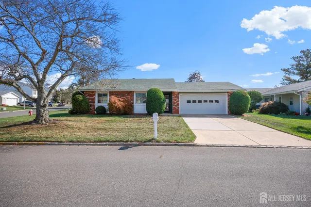 a house with trees in front of it