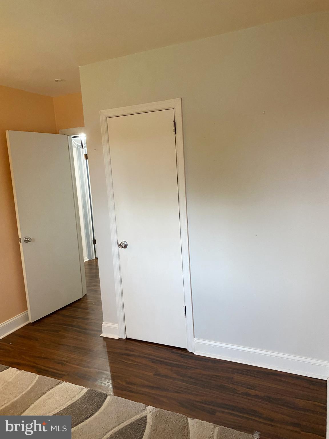 10 Tuscany Road Aston, PA 19014 - Photo 17 of 53 a view of an empty room with wooden floor and a window