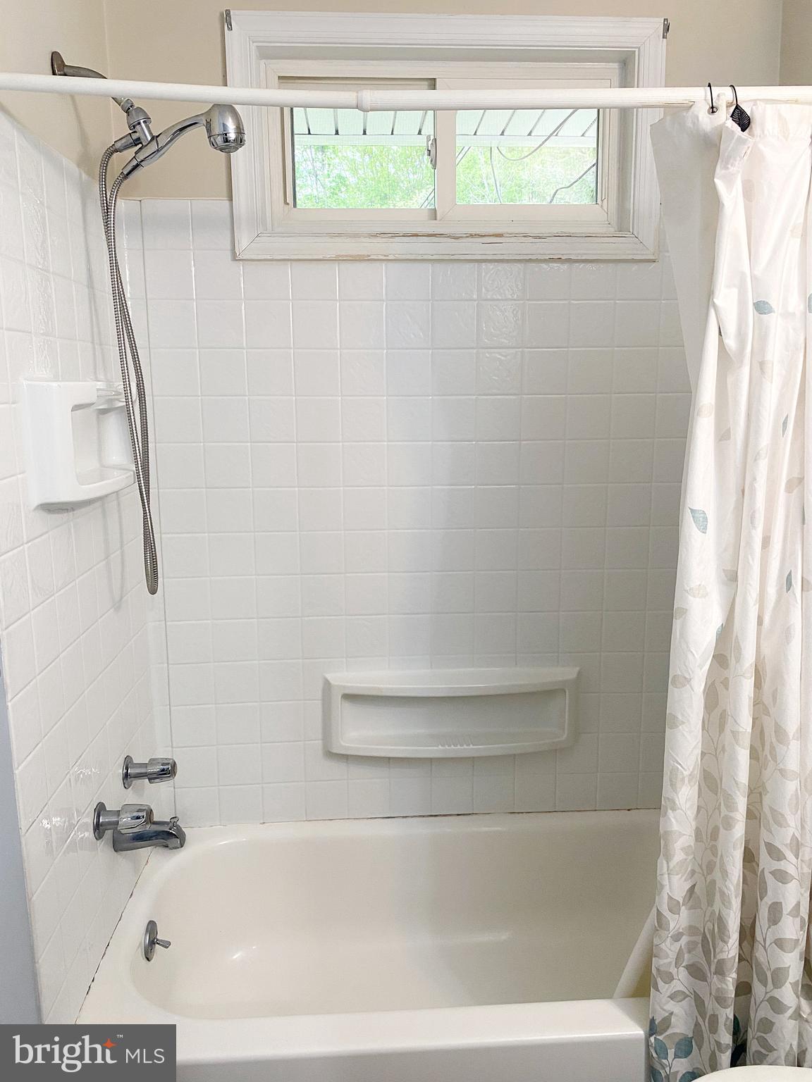10 Tuscany Road Aston, PA 19014 - Photo 25 of 53 a bathroom with a shower and a tub