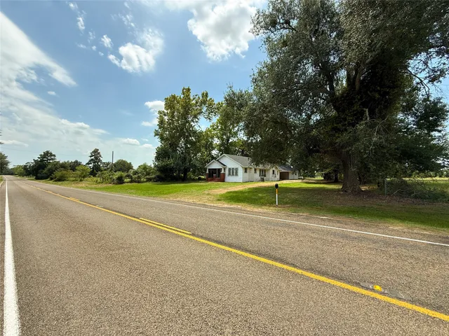 a view of a playground with basketball court
