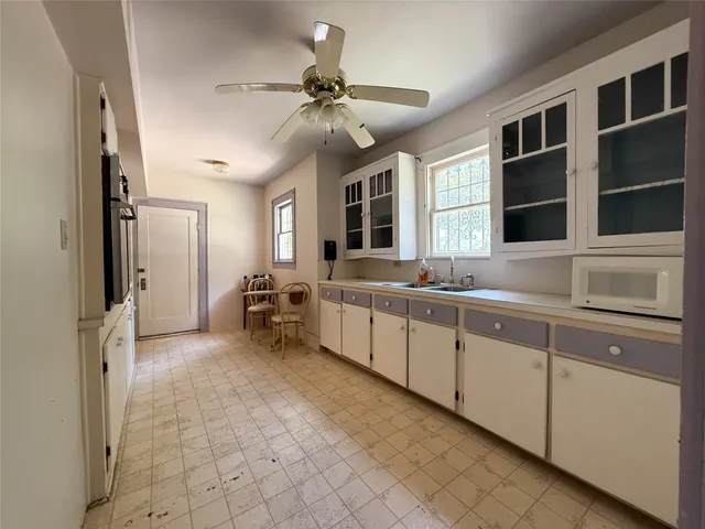 a bed room with a bed and a window