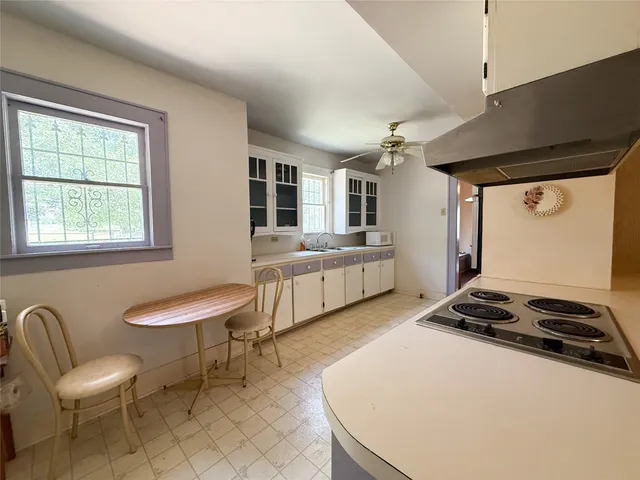 a livingroom with furniture and a window