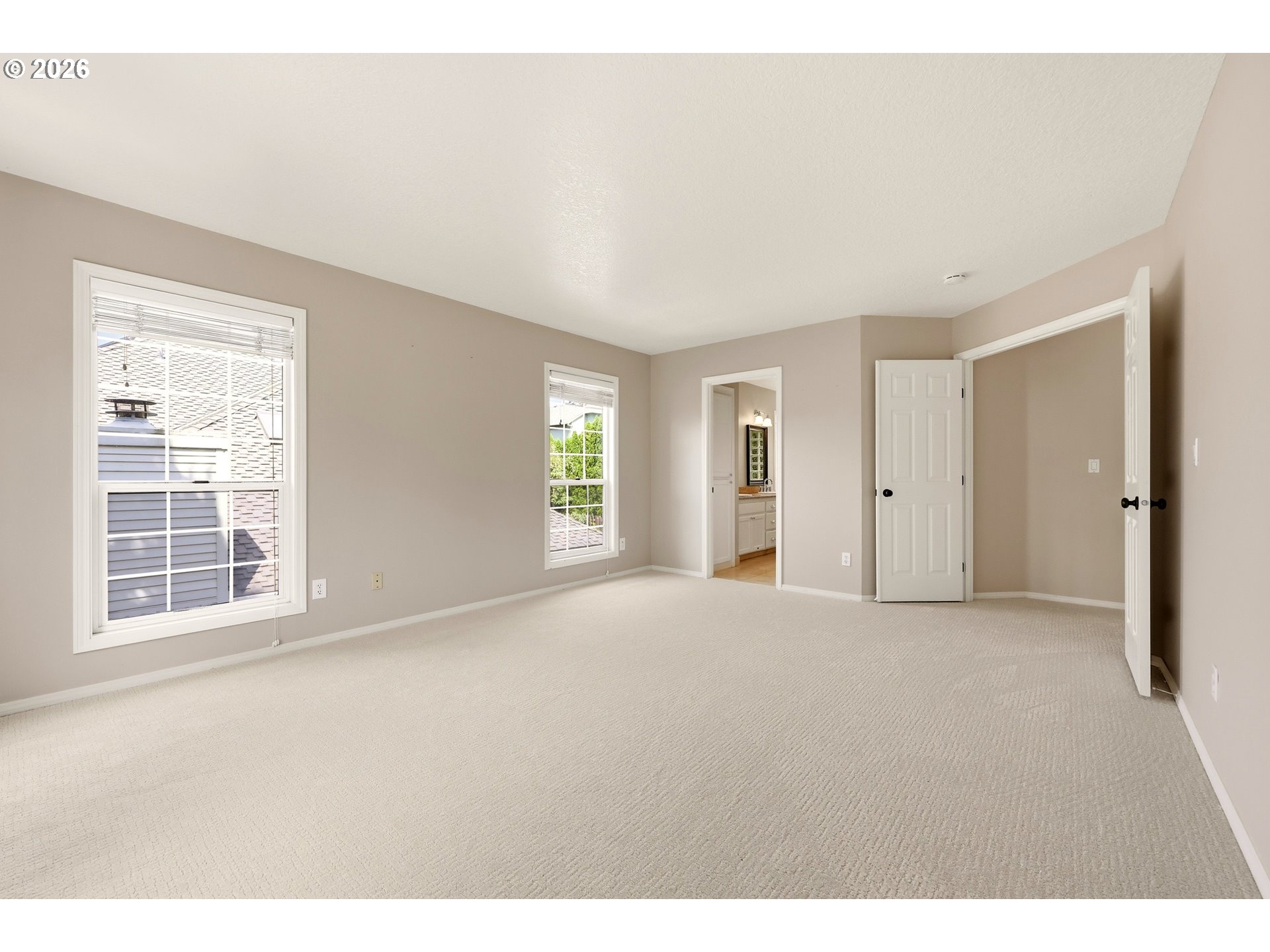 5807 Ridgetop Court Lake Oswego, OR 97035 - Photo 24 of 42 a view of an empty room with a window